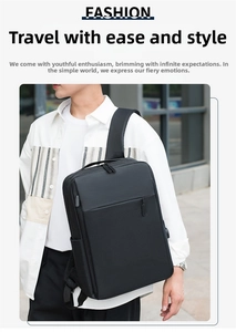 Detail view of the black backpack's side USB charging port and waterproof fabric texture