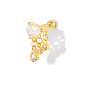 Detail view of gold S925 silver ear stud with pear-shaped gems and three dangling chains
