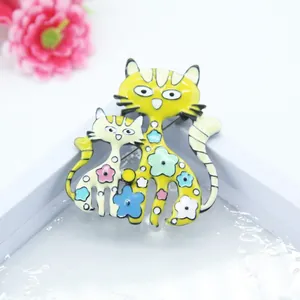 Cartoon enamel cat brooch set with floral patterns on yellow polished alloy base