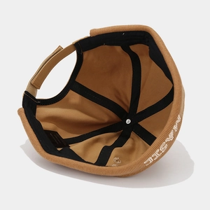 Inside view of khaki docker cap showing cotton lining and adjustable buckle strap