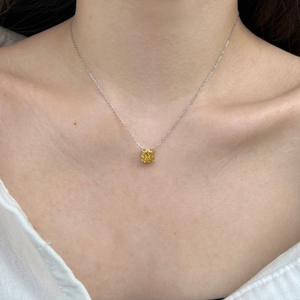 S925 silver necklace with princess cut yellow zircon pendant worn on neck