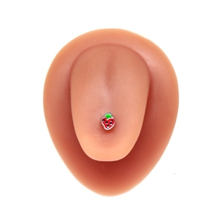 Cute strawberry shaped stud earring in red and green enamel finish on ear model