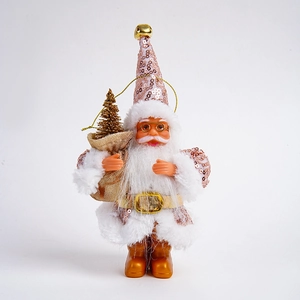 Detail of pink sequin Santa Claus figurine with white plush beard and golden gift bag