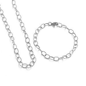 Silver metal O-chain necklace and bracelet jewelry set with textured oval links