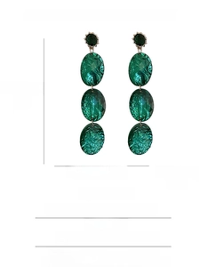 Detail view of long emerald acrylic earrings with rhinestones and S925 silver needles