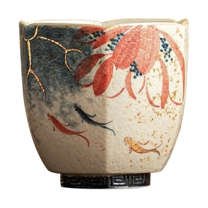 Hand-painted ceramic tea cup featuring red flowers, koi fish and gold crackle accents