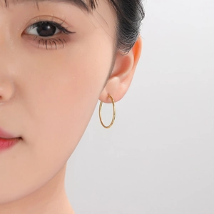 Elegant 18K gold plated thick hoop earrings for women in a minimalist classic style