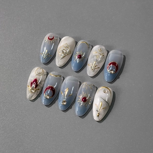 Stickers ongles 5D embossés avec texture marbre et motifs dorés soleil et lune célestes