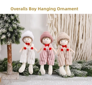 Detailed trio of knit Christmas boy dolls in pink and beige on winter background
