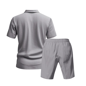 Detailed back view of men's grey linen polo and shorts set showing fabric texture