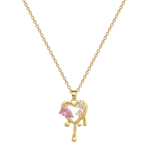 Titanium steel gold necklace with a melting heart pendant featuring pink and clear crystals