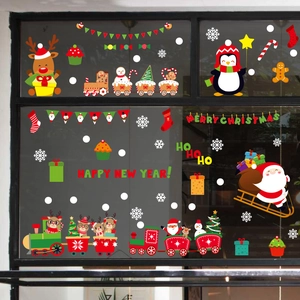 Colorful Christmas window stickers with Santa, reindeer and snowflakes for festive glass decor