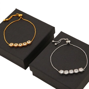 Adjustable crescent moon bracelets in gold and silver with five square cubic zirconia