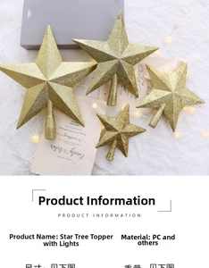 Detailed view of gold glitter Christmas tree topper star with integrated LED light strings