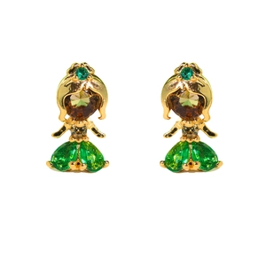 Detailed macro view of mermaid-shaped earrings with brown and green cubic zirconia stones