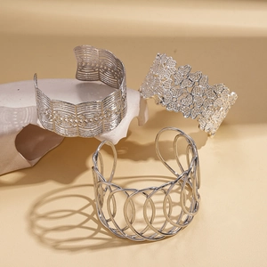 Three-piece silver hollow geometric open bracelets with flower patterns and crisscross design