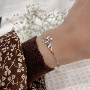 Cute bunny and carrot pendant bracelet with diamonds on elegant silver chain