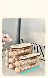 Auto-rolling egg storage box with multi-layer slope design for fridge organization