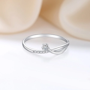 S925 sterling silver ring with sparkling central stone and overlapping diamond band