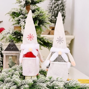 Christmas gnome wine bottle covers in red and grey plush felt with snowflake embroidery