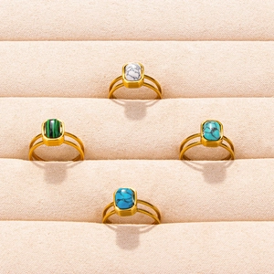 Set of four 304 stainless steel open rings with turquoise and marble stone inlays