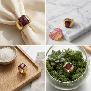 Macro shot of gold-plated wide band ring with a large rectangular magenta gemstone