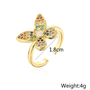 Close-up of gold-plated butterfly open ring with colorful zircon inlay details