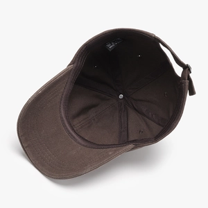Brown graffiti cotton baseball cap with adjustable metal strap and six-panel design