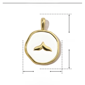 Detail view of gold enamel whale tail pendant with size parameters 18mm by 13mm