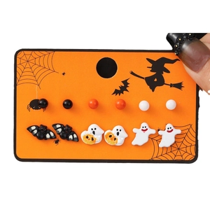 6-pair Halloween stud earring set featuring pumpkin ghosts and black bats on orange card