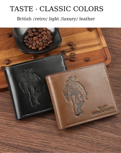 Detail of embossed leather bifold wallets for men in black and brown on wooden background