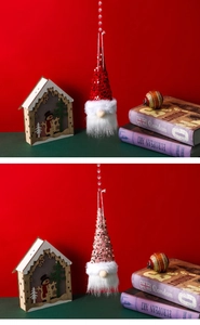 Close-up of light-up Christmas gnome hangers with sequins and glowing festive decor