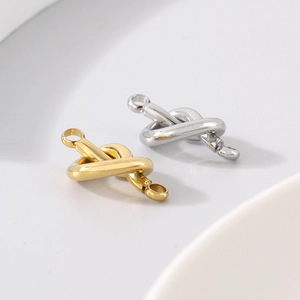 Twisted knot heart-shaped stainless steel jewelry connectors in gold and silver finish