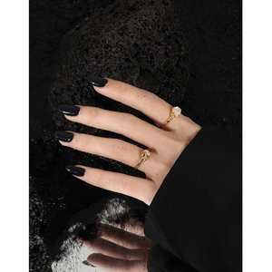 Minimalist S925 silver knot ring and gemstone ring set shown in a gold finish