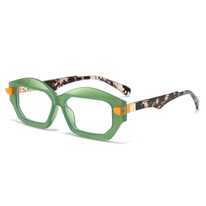 Modern green geometric sunglasses with tortoiseshell temples and orange accents shown in profile
