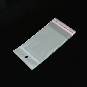 Clear self-adhesive OPP packaging bags with round hanging holes for jewelry display