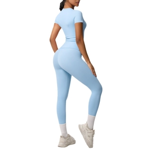 Light blue two-piece yoga set with short sleeve t-shirt and high waist leggings