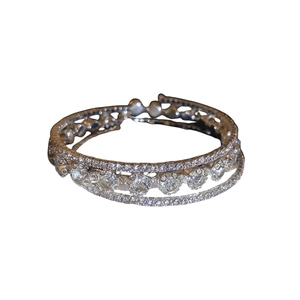 Exquisite multi-layer silver bangle with sparkling rhinestones and flower accents