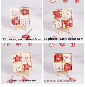 Detailed view of 12-piece red and white wooden Christmas tree ornaments in a gift box