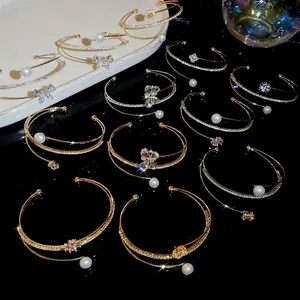 Three-layer gold floral bangle with sparkling zircon and pearls in French court style