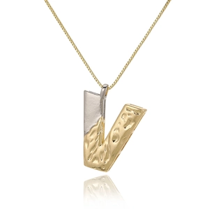 Detail of two-tone V-letter pendant with lava texture and golden box chain