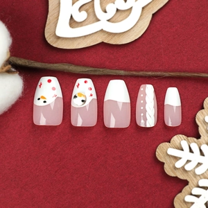 Faux ongles de Noël avec motifs bonhomme de neige et texture tricot 3D sur velours rouge