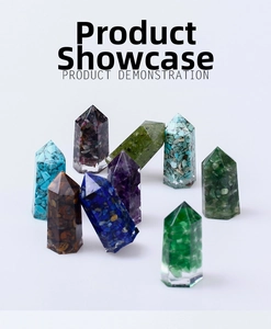 Macro shot of assorted resin crystal pillars with natural gemstones for meditation