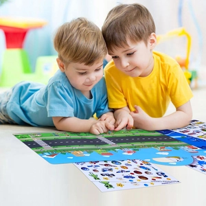 Kids playing with reusable city road traffic stickers on an interactive scene play mat