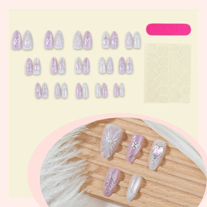 Handmade cat-eye press-on nail kit with 3D silver stars and pearls on purple and white base