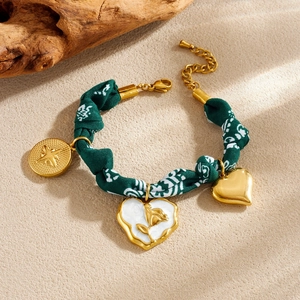 French vintage green fabric cord bracelet with gold heart and flower pendants