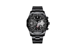 Close-up of black metal chronograph watch with tachymeter bezel and date window