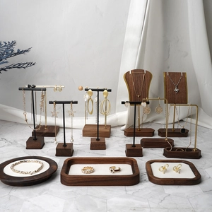 Solid wood jewelry display set with metal earring stands and necklace organizers