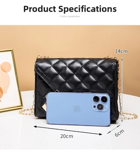 Detailed size specifications for the black quilted crossbody bag with chain strap