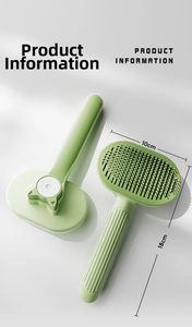 Detail view of the self-cleaning cat brush with dimensions 10cm by 18cm for grooming